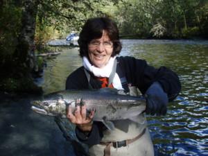 At the end of our season this year even Mrs. Murray, Craig's wife got to play.   One of several nice Coho that Deborah caught this day puts the smile on her face.  It's not all work.